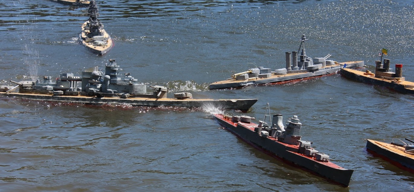 a model Bismark is attacked from multiple angles by enemy ships